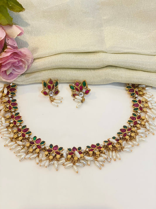 Emarald and Ruby Lotus Necklace